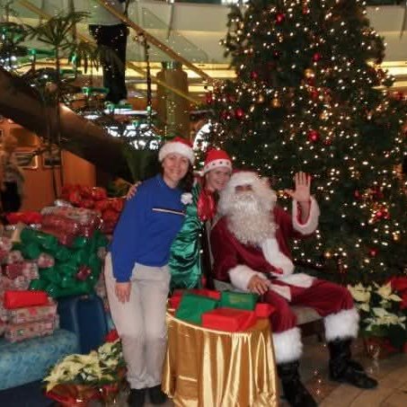 David with Father Christmas by the atrium Christmas tree